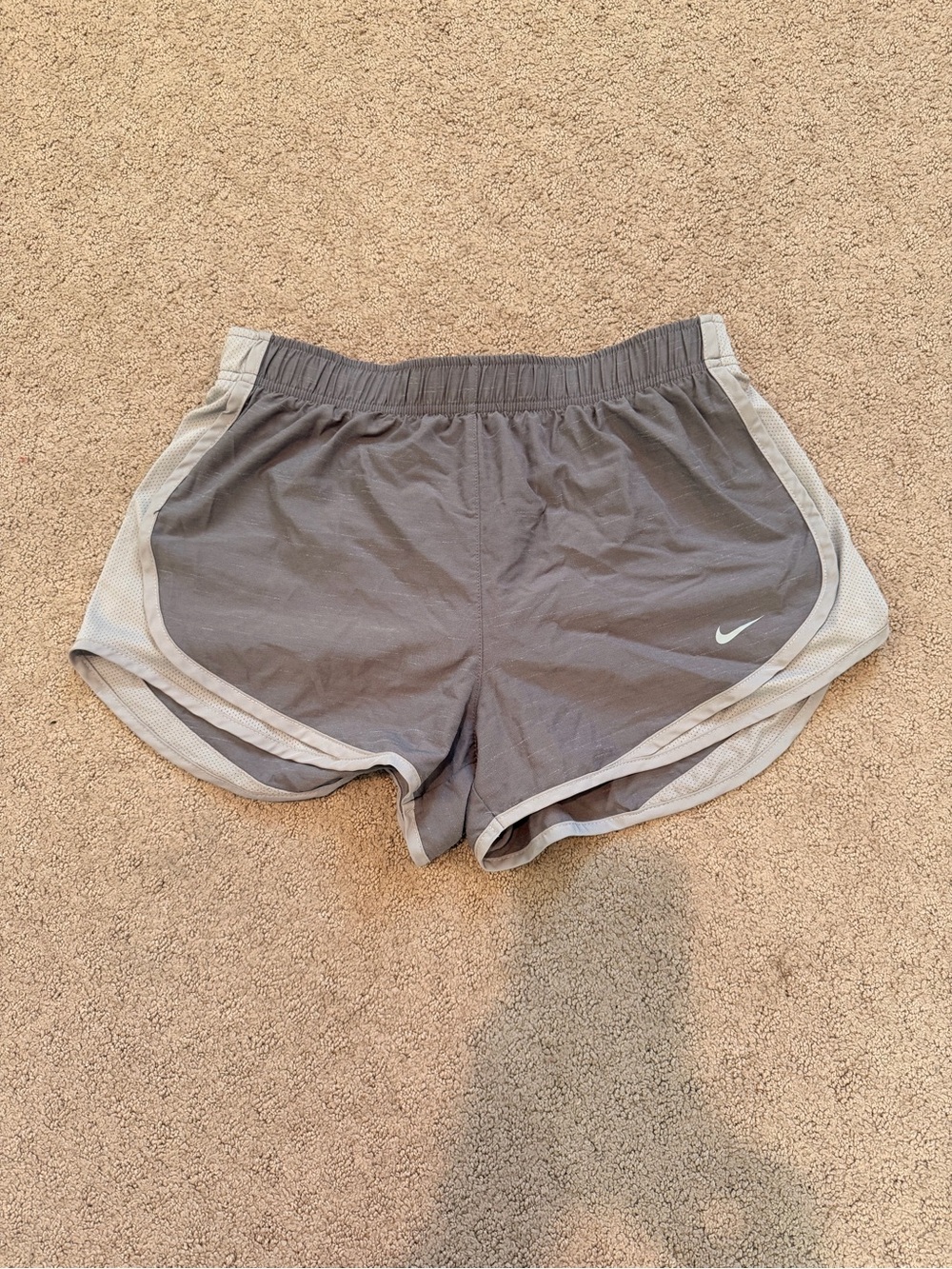 Nike Women's Charcoal Gray Athletic Running Shorts with Light Gray Trim
